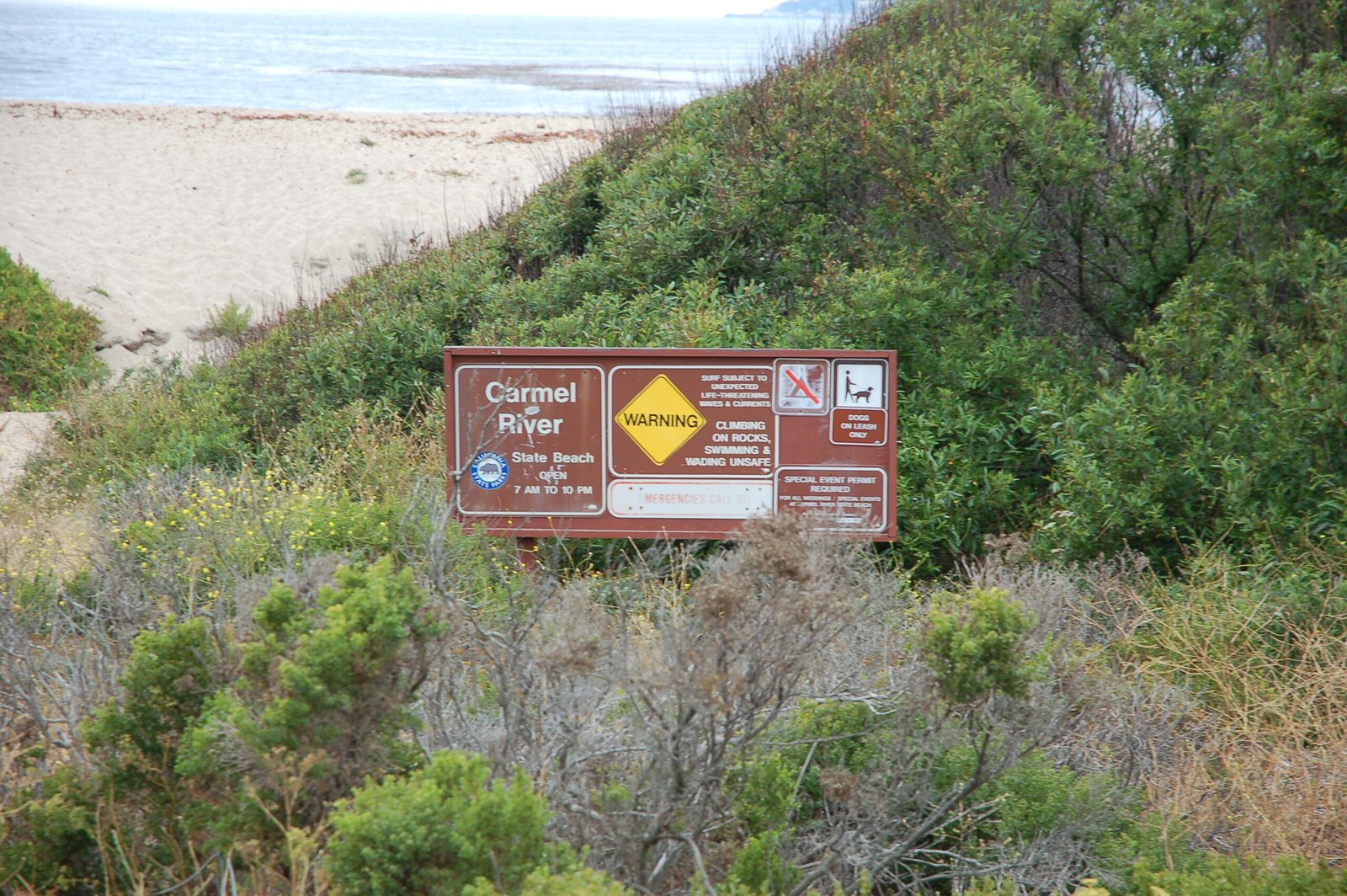Warning sign at Monastery Beach entrance